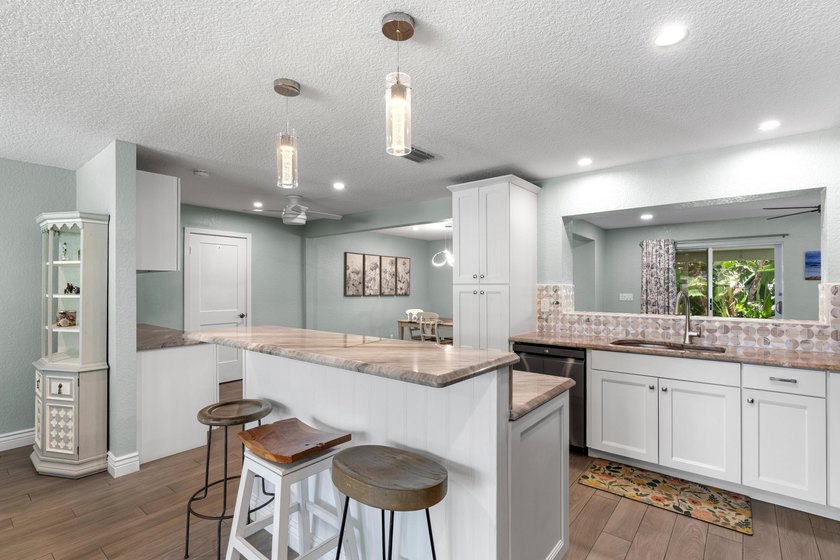 Completely transformed and move-in ready with NO HOA! This - photo 9