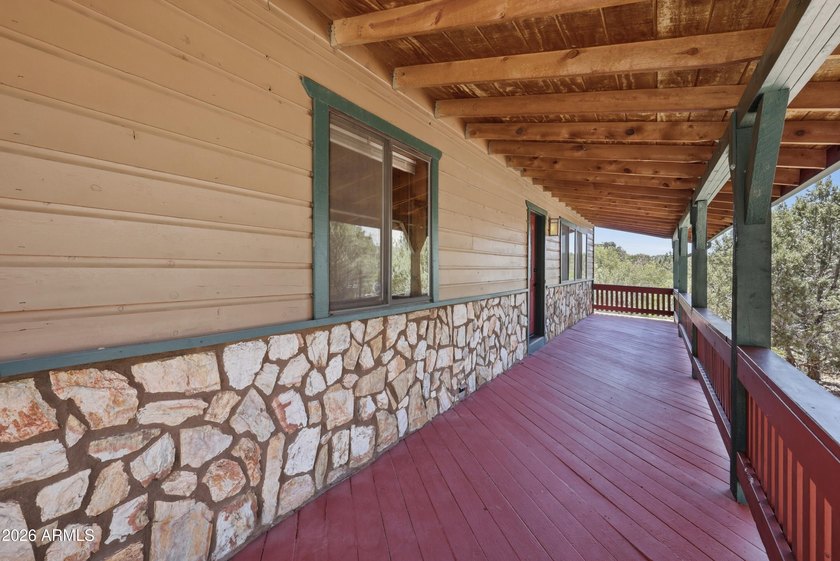 This corner-lot gem captures the perfect mountain-home look and - photo 9