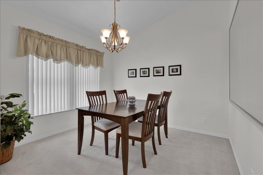 Welcome to this charming single-story residence in Kings Isle at - photo 9