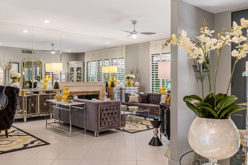 This stunning Hollywood Regency-inspired home inside the gates - photo 8