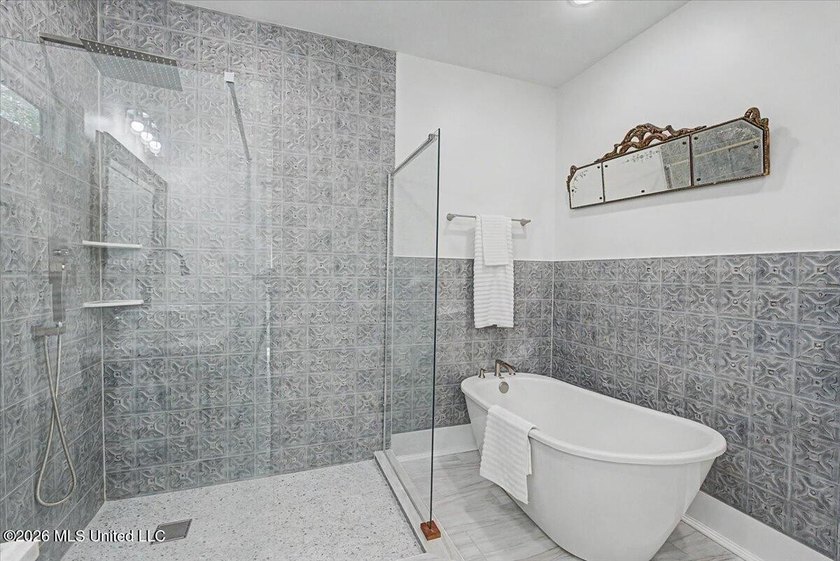 This beautifully renovated home combines modern luxury with - photo 13