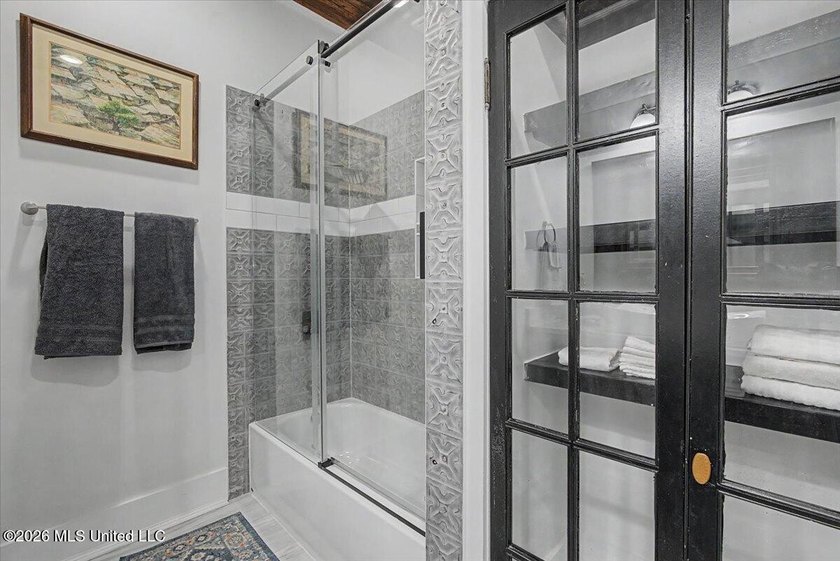 This beautifully renovated home combines modern luxury with - photo 17