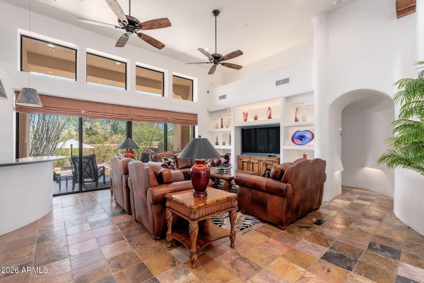 Nestled on a quiet cul-de-sac within the guard-gated community - photo 3