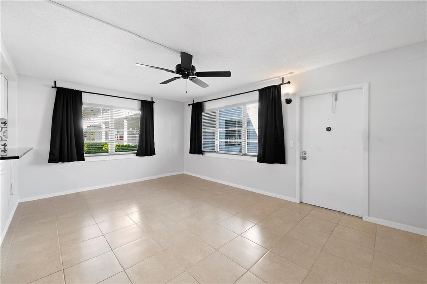 Spacious 1-bedroom, 1.5-bathroom condo conveniently located on - photo 5