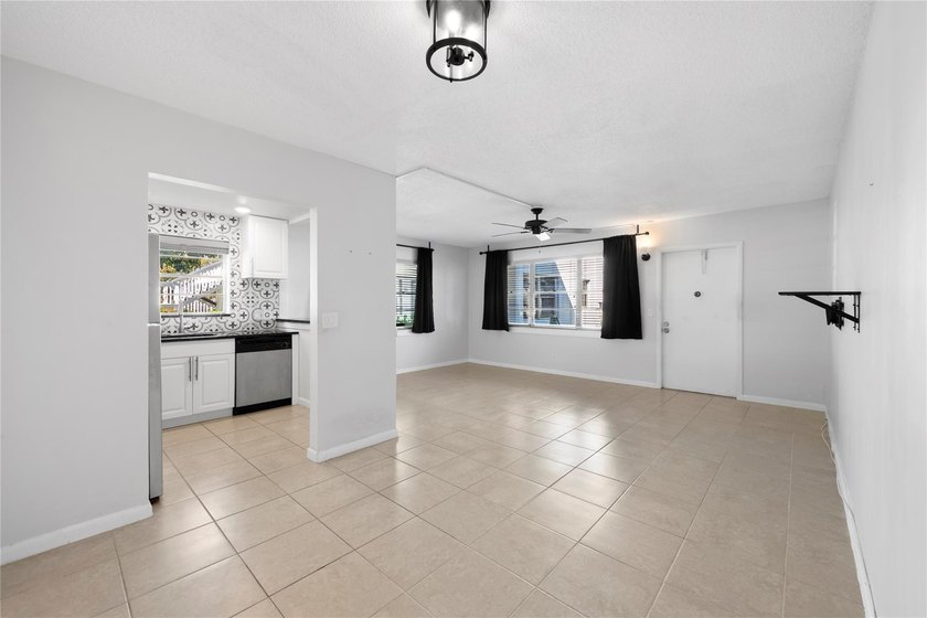 Spacious 1-bedroom, 1.5-bathroom condo conveniently located on - photo 6
