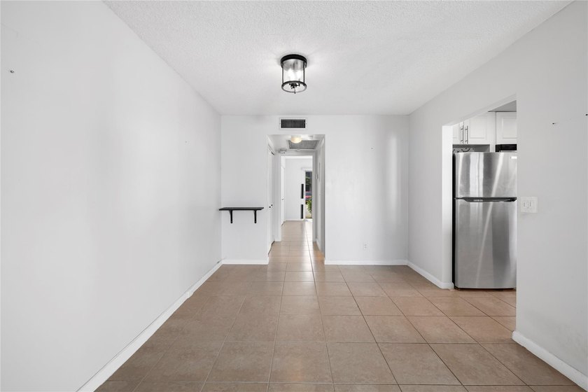 Spacious 1-bedroom, 1.5-bathroom condo conveniently located on - photo 8
