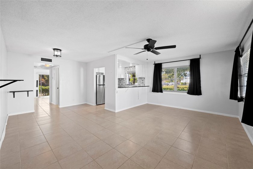 Spacious 1-bedroom, 1.5-bathroom condo conveniently located on - photo 10
