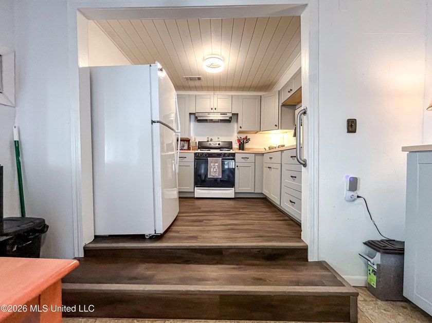 Coastal charm meets modern convenience in this beautifully - photo 11