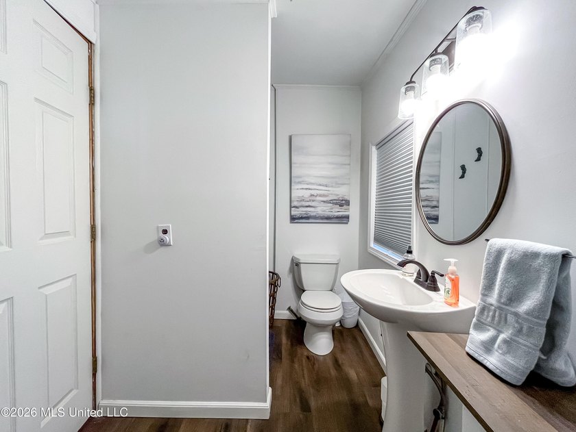 Coastal charm meets modern convenience in this beautifully - photo 15