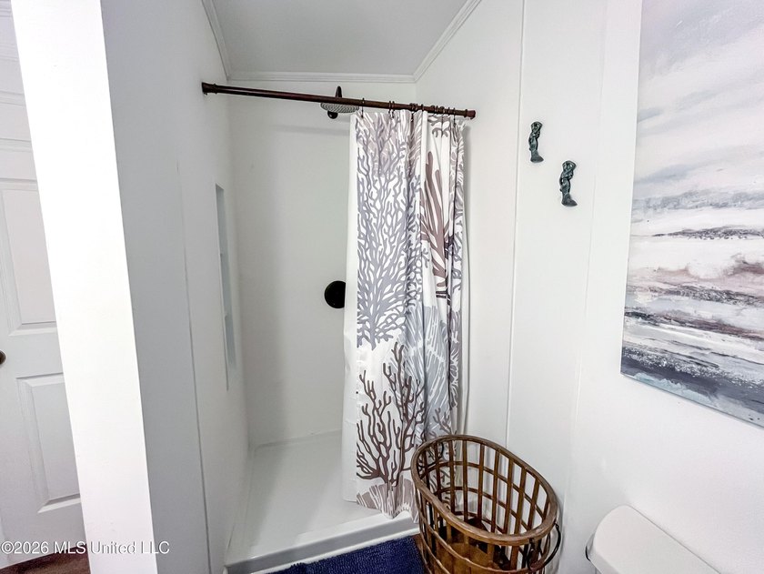 Coastal charm meets modern convenience in this beautifully - photo 16