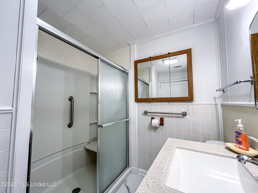 Coastal charm meets modern convenience in this beautifully - photo 20