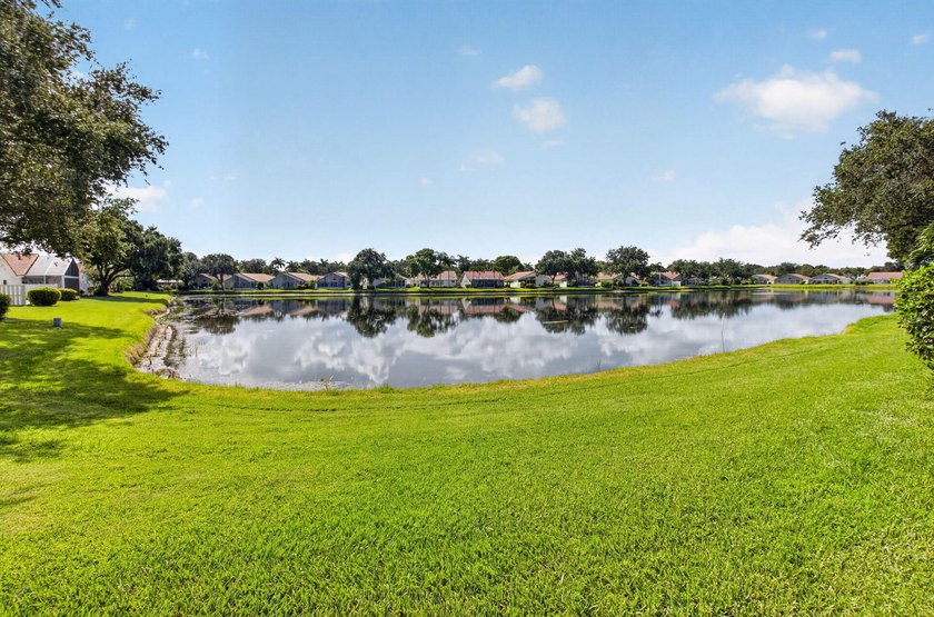 Watch the sunrise from this 3 bedroom-2 bath home on a LAKEFRONT - photo 5