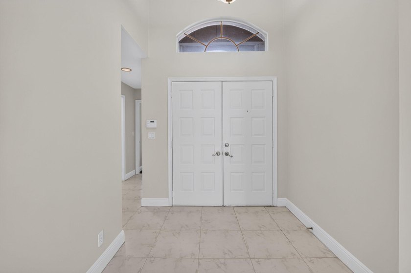 Watch the sunrise from this 3 bedroom-2 bath home on a LAKEFRONT - photo 7