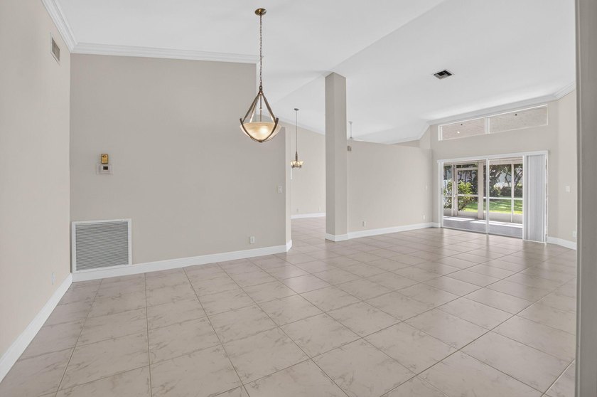 Watch the sunrise from this 3 bedroom-2 bath home on a LAKEFRONT - photo 9