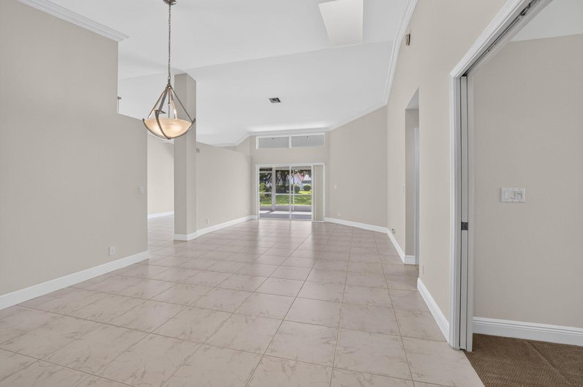 Watch the sunrise from this 3 bedroom-2 bath home on a LAKEFRONT - photo 10