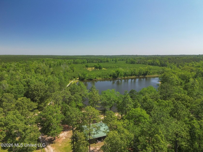 Tucked away among the rolling hills of South Mississippi, this - photo 2