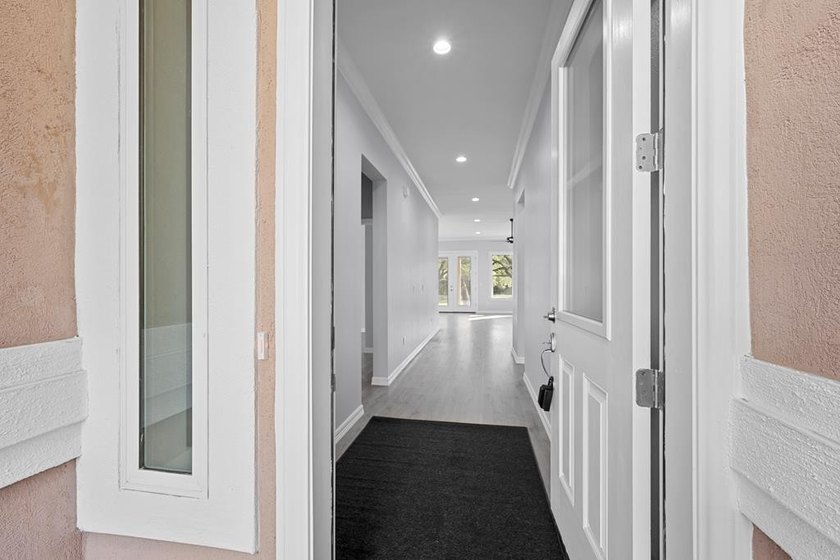 Beautiful new 3/2/2 home in secluded St. Andrews Place, nestled - photo 3