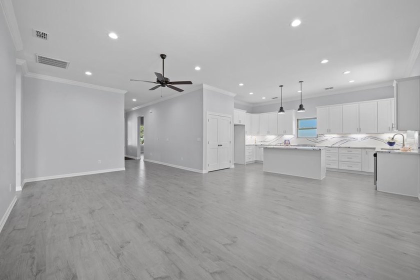 Beautiful new 3/2/2 home in secluded St. Andrews Place, nestled - photo 7