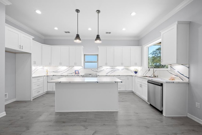 Beautiful new 3/2/2 home in secluded St. Andrews Place, nestled - photo 9
