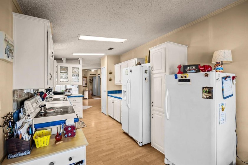 Enjoy lakeside living in this 3-bedroom, 2-bath home located in - photo 11