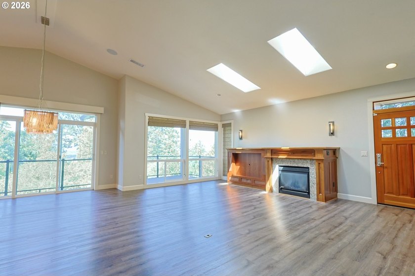Thoughtfully designed with spacious rooms and an open, vaulted - photo 11