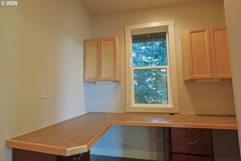 Thoughtfully designed with spacious rooms and an open, vaulted - photo 17