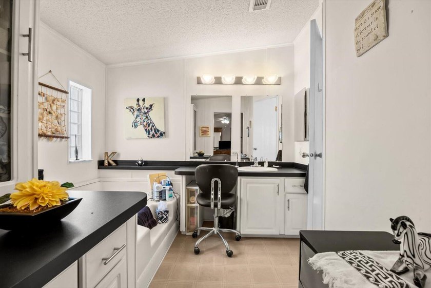 Enjoy lakeside living in this 3-bedroom, 2-bath home located in - photo 20