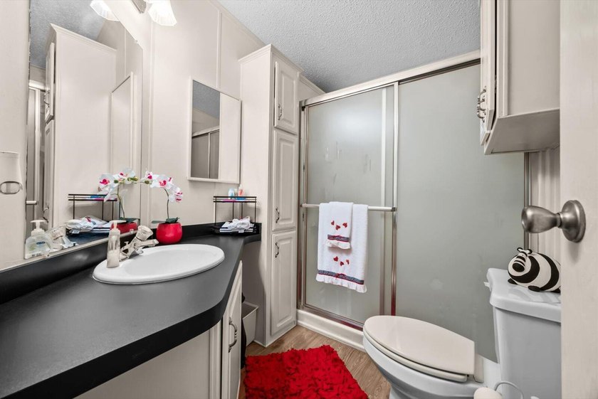 Enjoy lakeside living in this 3-bedroom, 2-bath home located in - photo 25