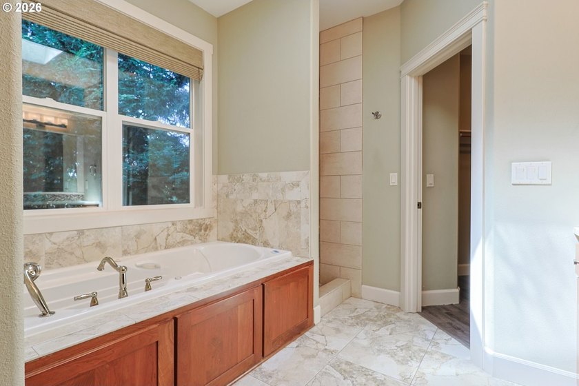 Thoughtfully designed with spacious rooms and an open, vaulted - photo 30