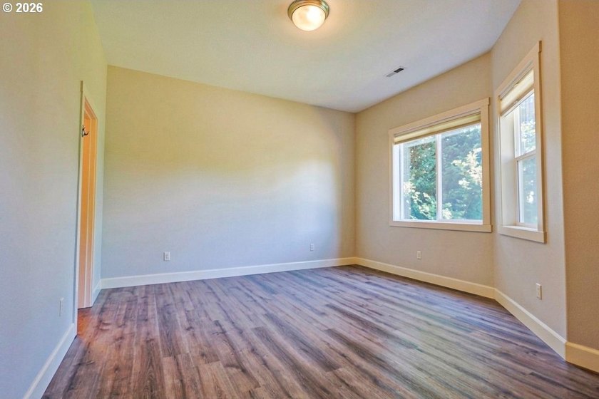 Thoughtfully designed with spacious rooms and an open, vaulted - photo 37