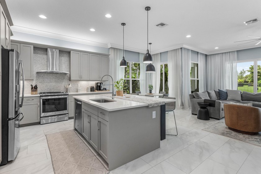 Beautiful one-story waterfront pool home in GL Homes' Dakota - photo 8