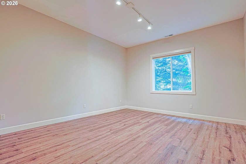 Thoughtfully designed with spacious rooms and an open, vaulted - photo 42