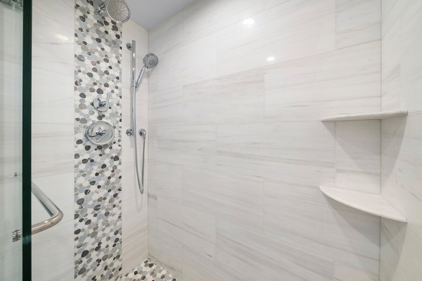 Stunning 4 Br/3 Ba Oceanfront lower-level unit. Designed - photo 17