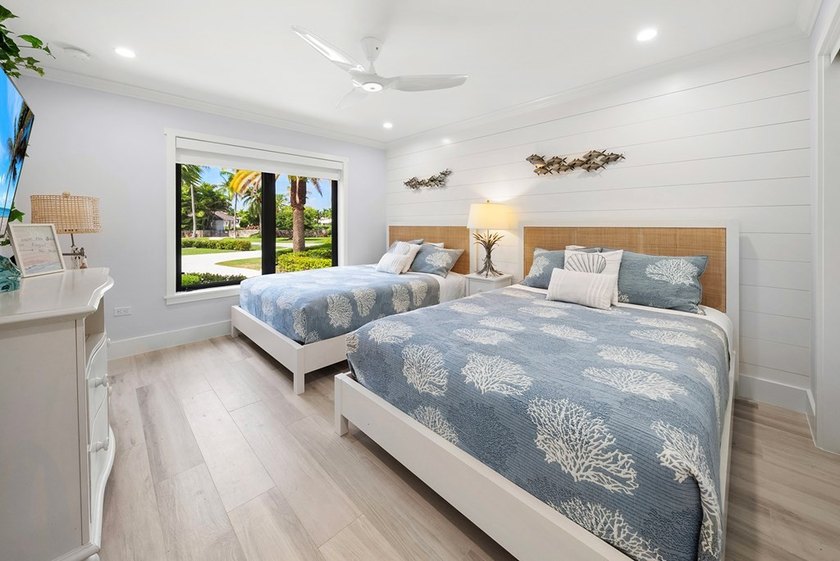 Stunning 4 Br/3 Ba Oceanfront lower-level unit. Designed - photo 22