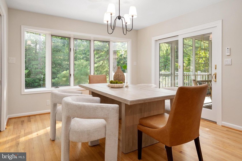Perfectly positioned on a beautifully landscaped corner lot in - photo 9