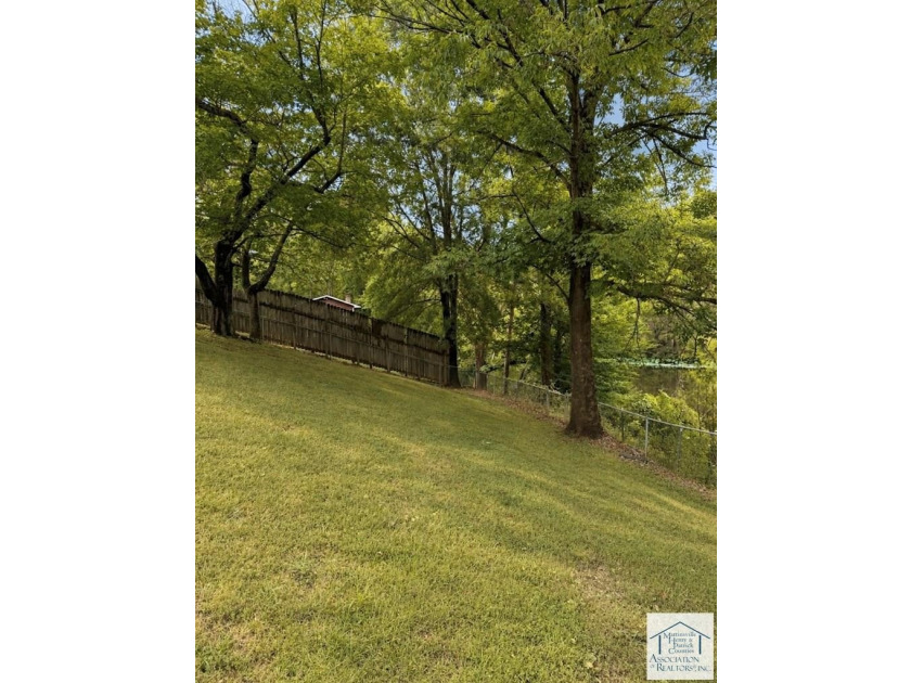 Welcome to this charming 3-bedroom, 2-full-bath brick ranch in - photo 4