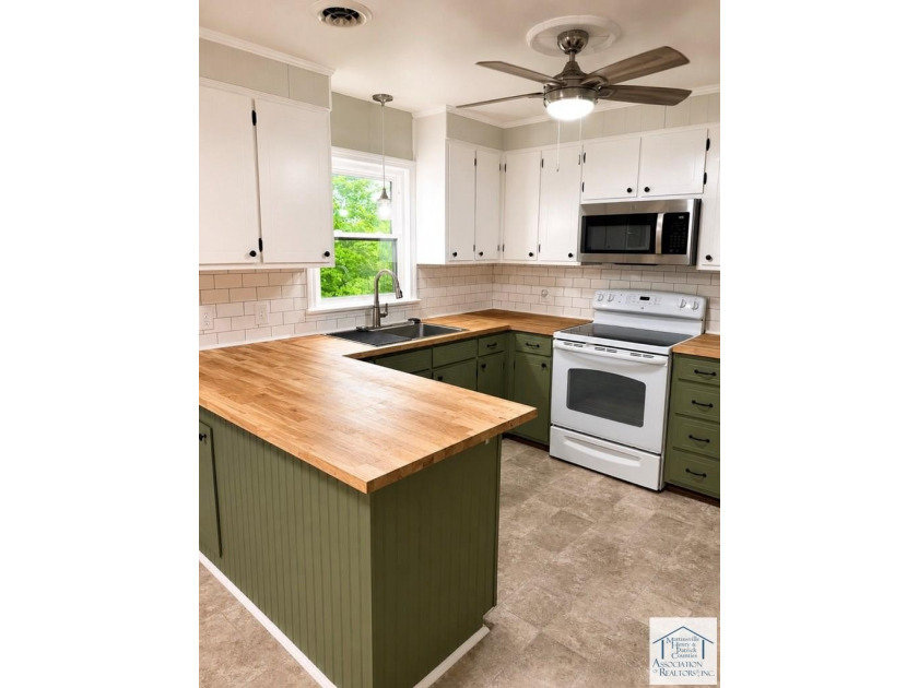 Welcome to this charming 3-bedroom, 2-full-bath brick ranch in - photo 6