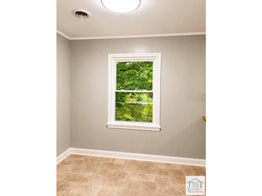 Welcome to this charming 3-bedroom, 2-full-bath brick ranch in - photo 7