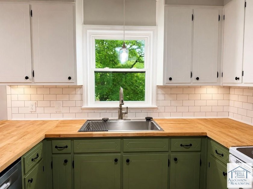 Welcome to this charming 3-bedroom, 2-full-bath brick ranch in - photo 8