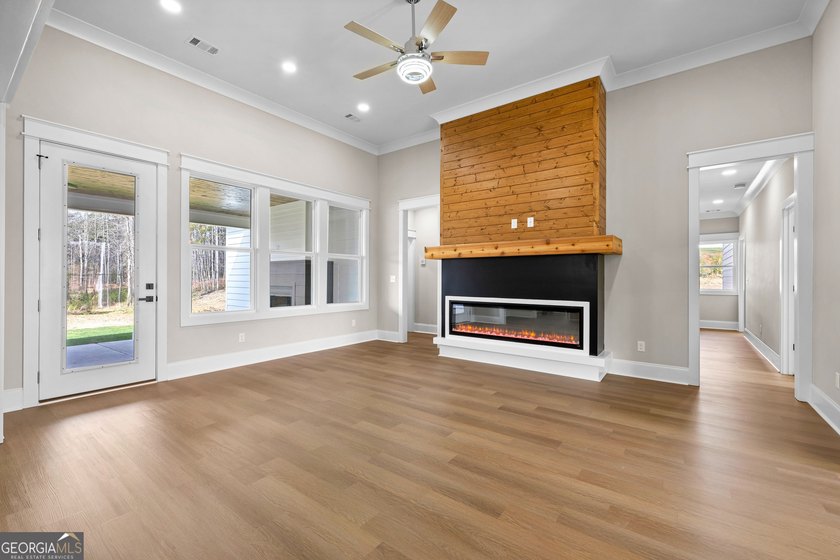 Stunning new construction overlooking a private lake, offering a - photo 13