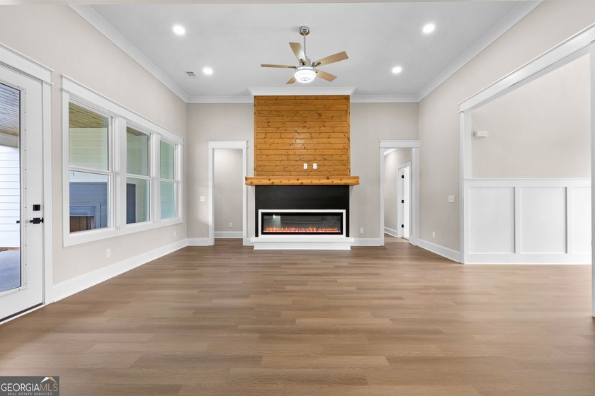 Stunning new construction overlooking a private lake, offering a - photo 14