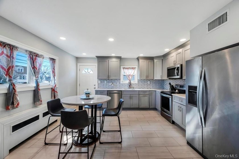 Welcome to this stunning expanded split level residence nestled - photo 14