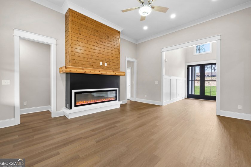 Stunning new construction overlooking a private lake, offering a - photo 16