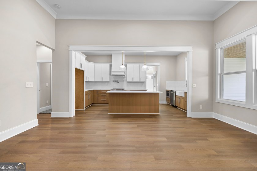 Stunning new construction overlooking a private lake, offering a - photo 19