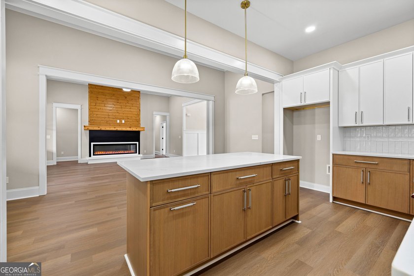 Stunning new construction overlooking a private lake, offering a - photo 26