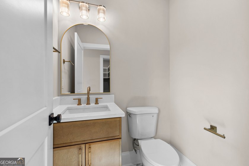 Stunning new construction overlooking a private lake, offering a - photo 28