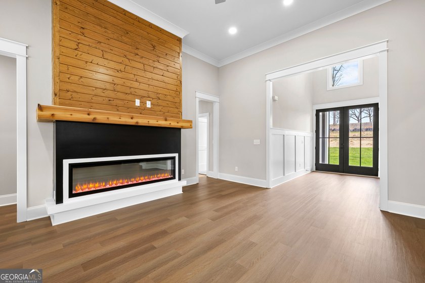 Stunning new construction overlooking a private lake, offering a - photo 38
