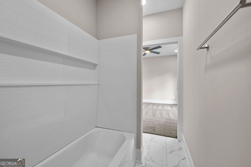Stunning new construction overlooking a private lake, offering a - photo 43