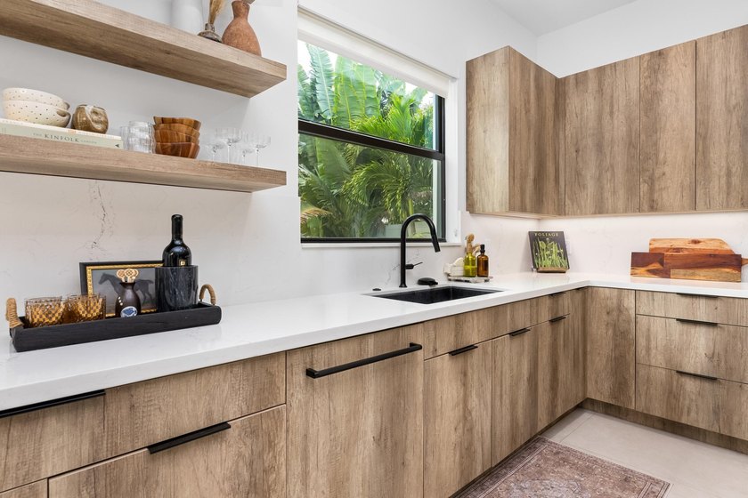 Built in 2022 and perfectly positioned in Boca Villas, this - photo 13