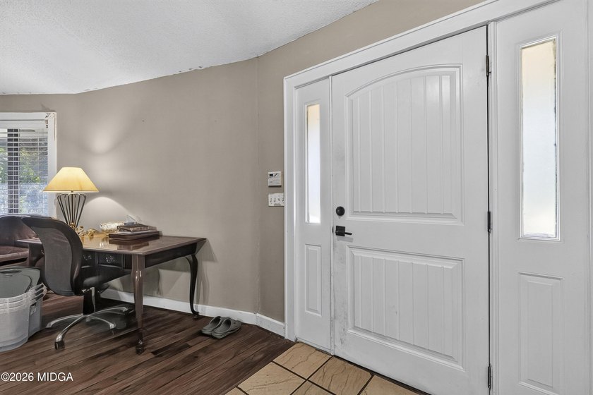 Welcome to one of Forsyth's most distinctive homes! This - photo 15